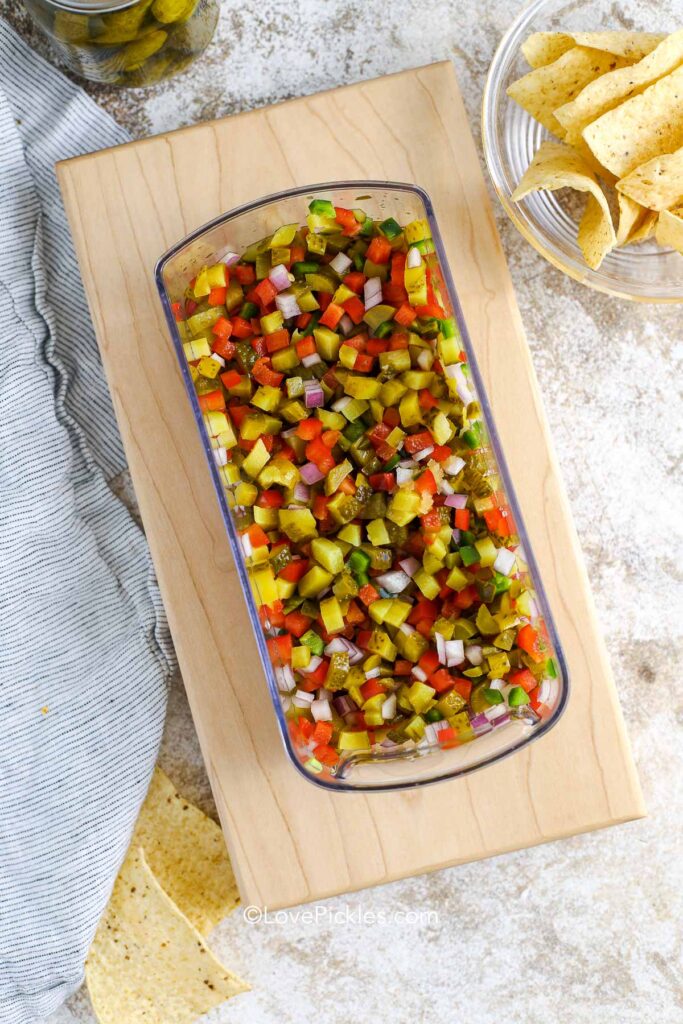 chopped ingredients in a container for pickle de gallo