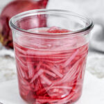 pickled red onions in a jar