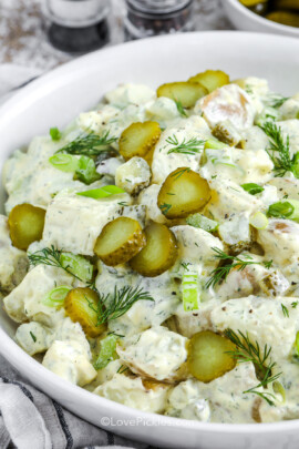 close up of dill pickle potato salad