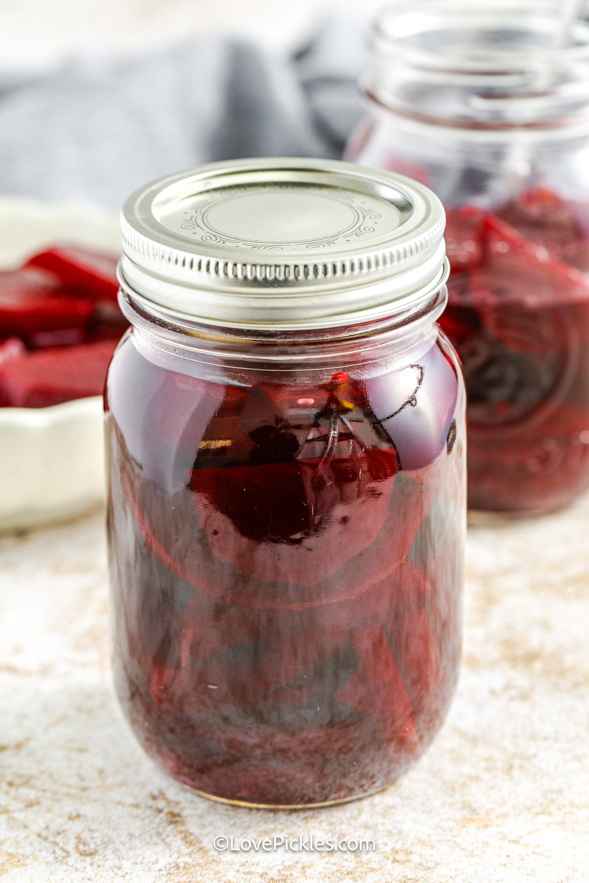 quick pickled beets in a jar with the lid on