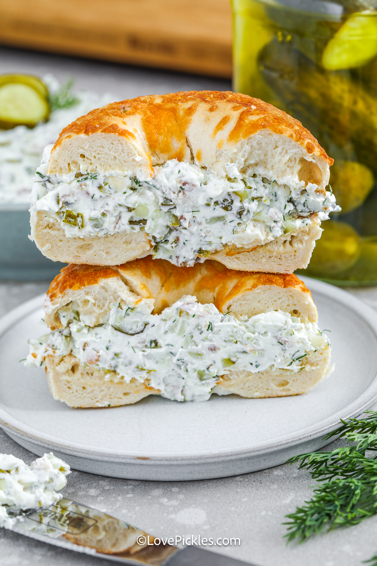 dill pickle cream cheese in a bagel