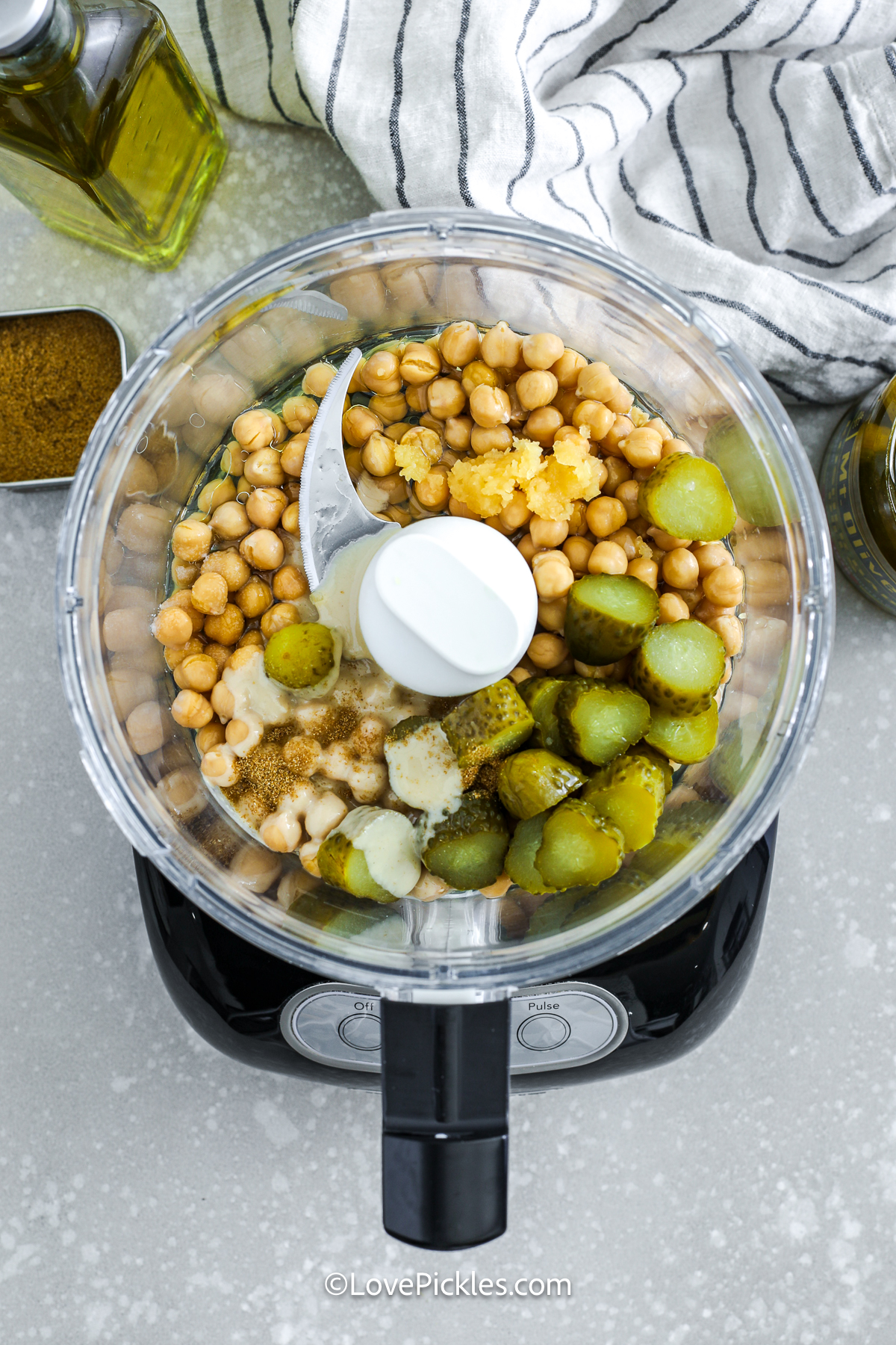 ingredients for dill pickle hummus in a food processor