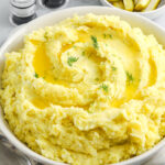 dill pickle mashed potatoes in a bowl