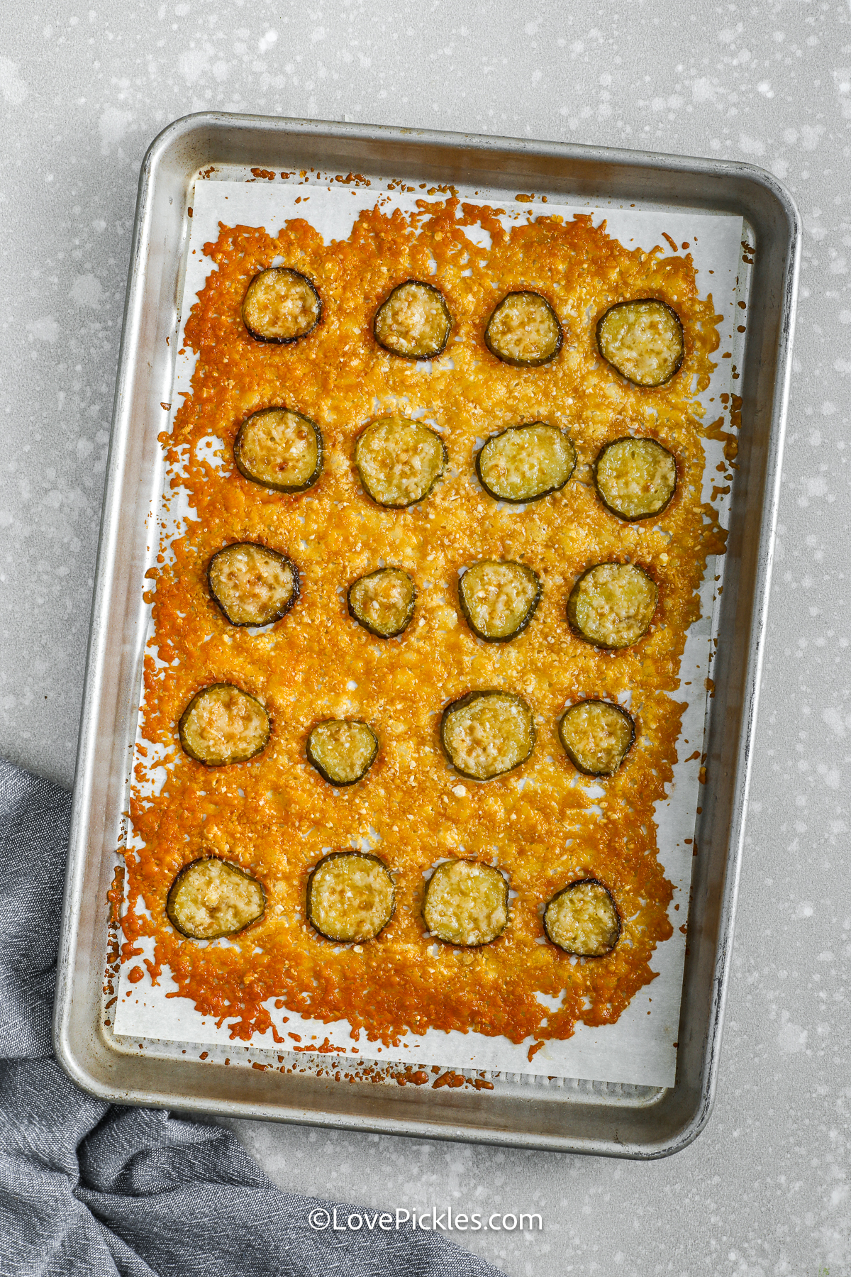 two ingredient fried pickles on a baking sheet to make cheese pickle chips