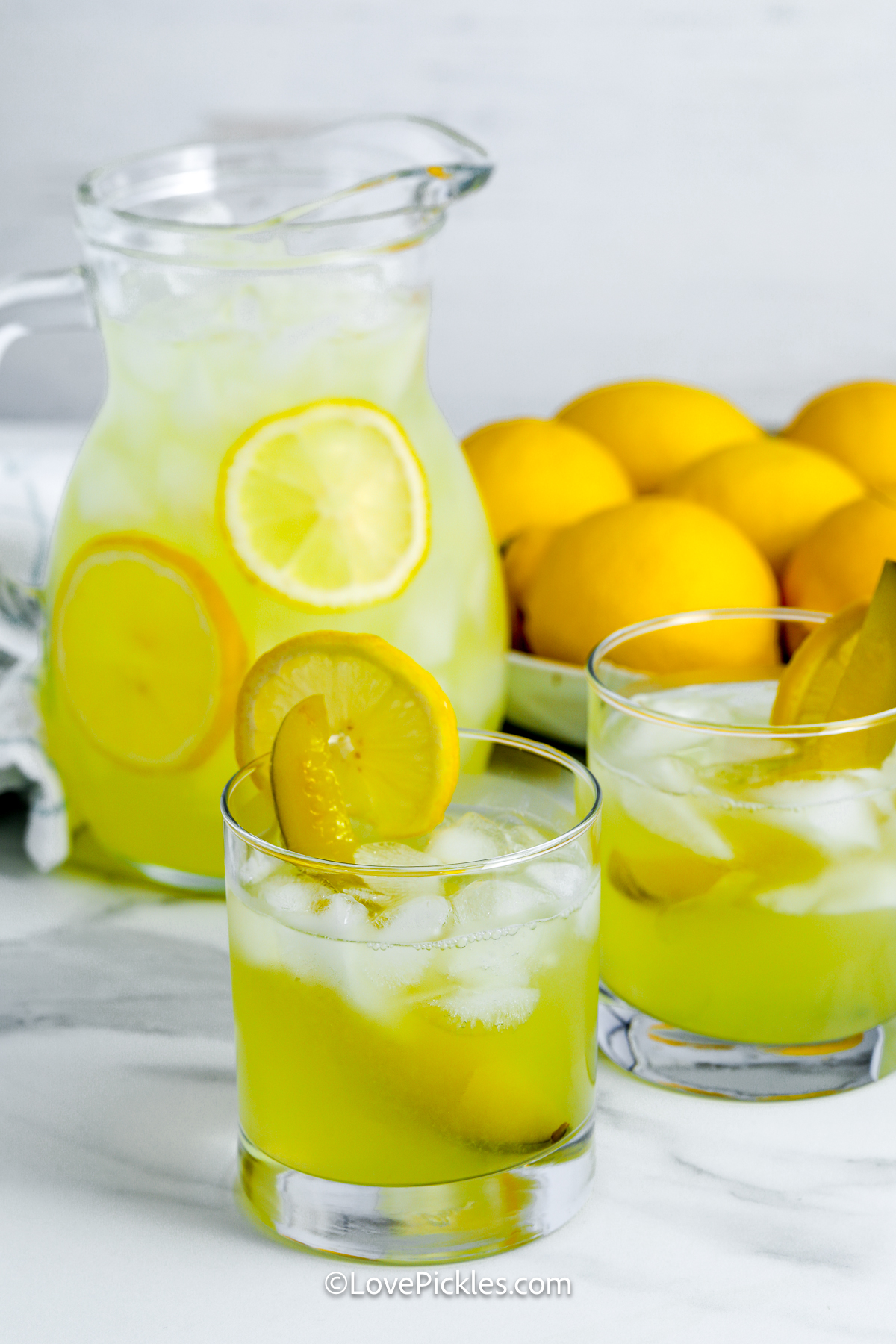 viral dill pickle lemonade in glasses