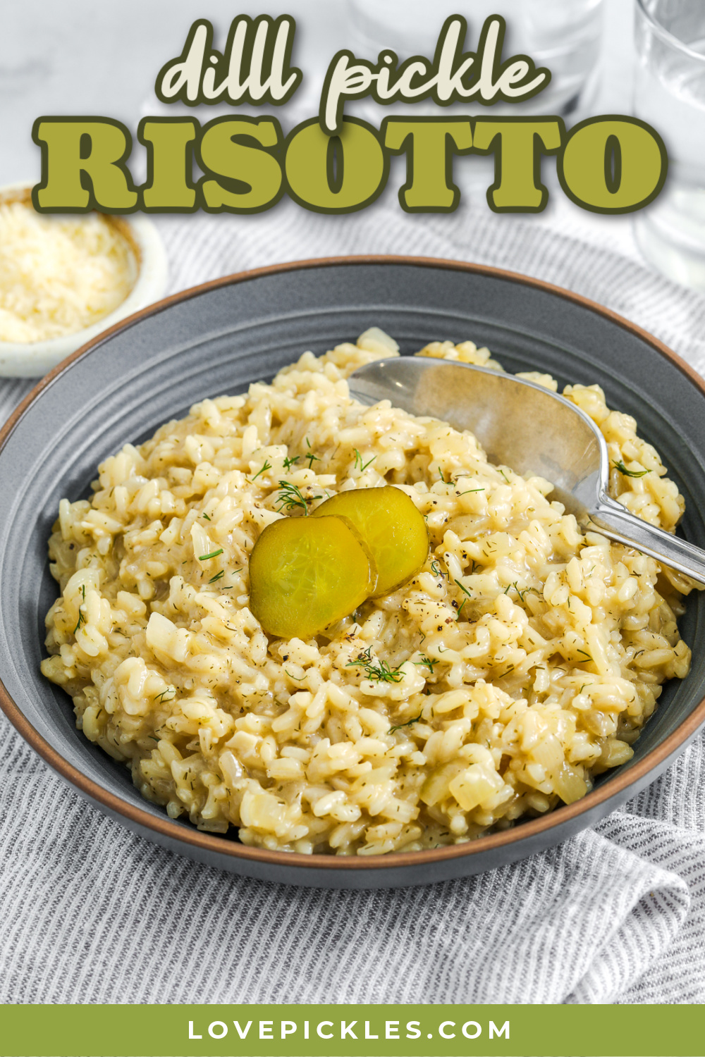Dill risotto takes a classic creamy dish and gives it a bold, briny twist. Arborio rice is simmered slowly with a mix of warm chicken broth and dill pickle juice, then finished with butter, Parmesan cheese, and fresh dill. The result is a tangy, rich, and savory risotto that’s surprisingly comforting and packed with flavor. It’s perfect for adventurous eaters or anyone craving something different. #lovepickles dill risotto with text